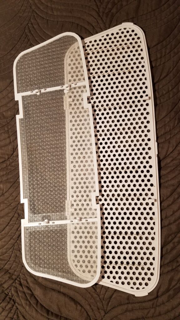 two pieces of clean AC ceiling filter