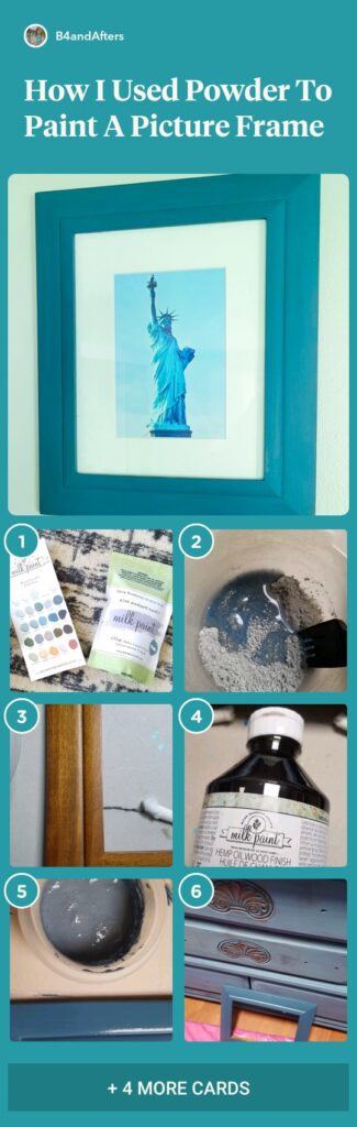 blue picture frame with Statue of Liberty