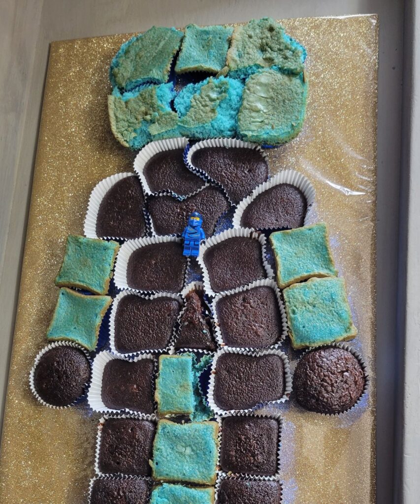 chocolate and blue cupcakes in the shape of a person