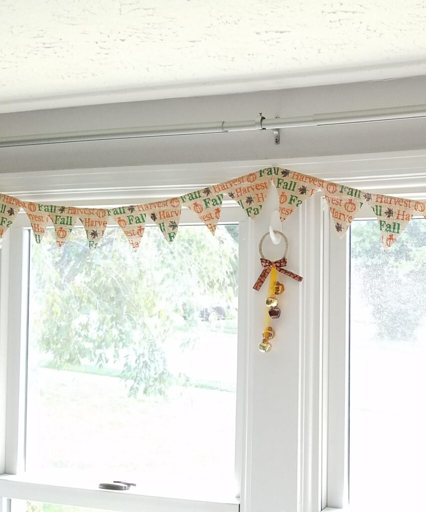 burlap banner across window