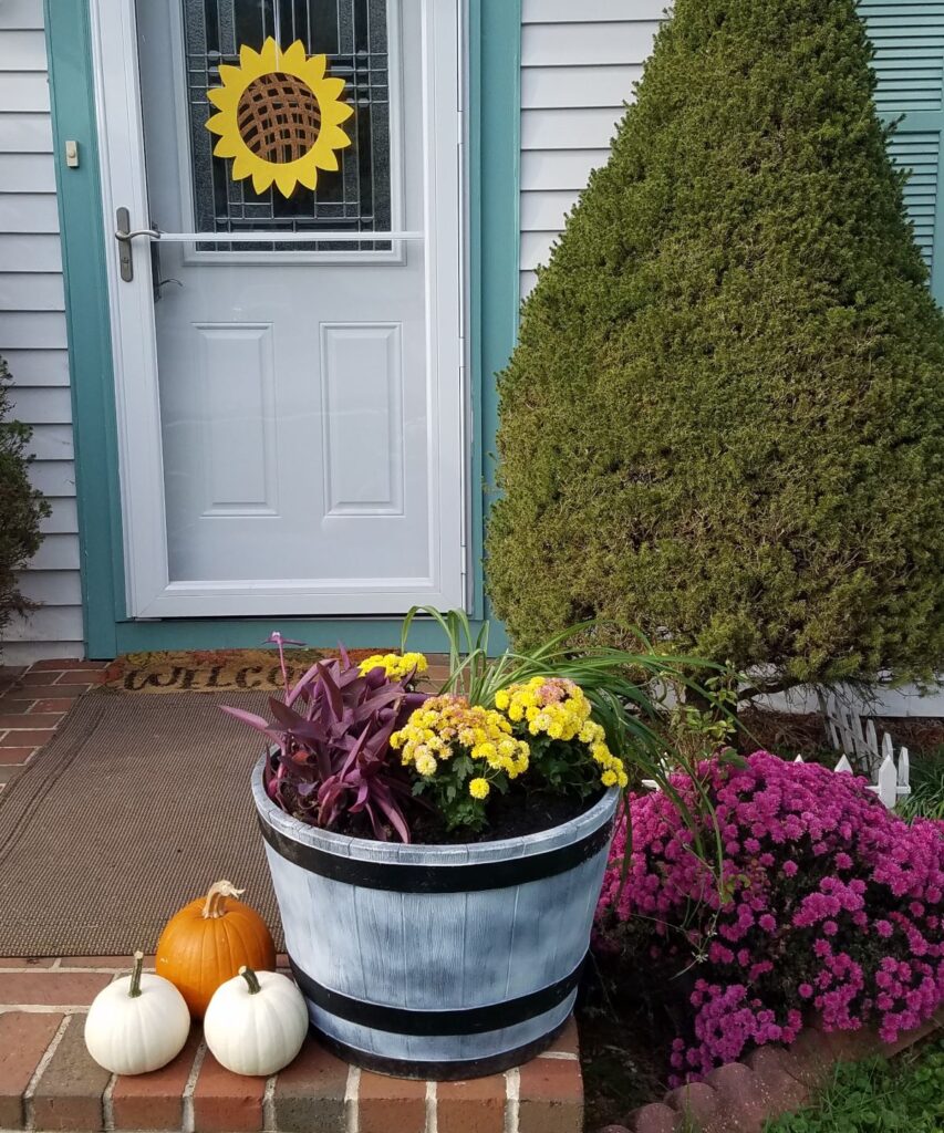 front step decorated for fall