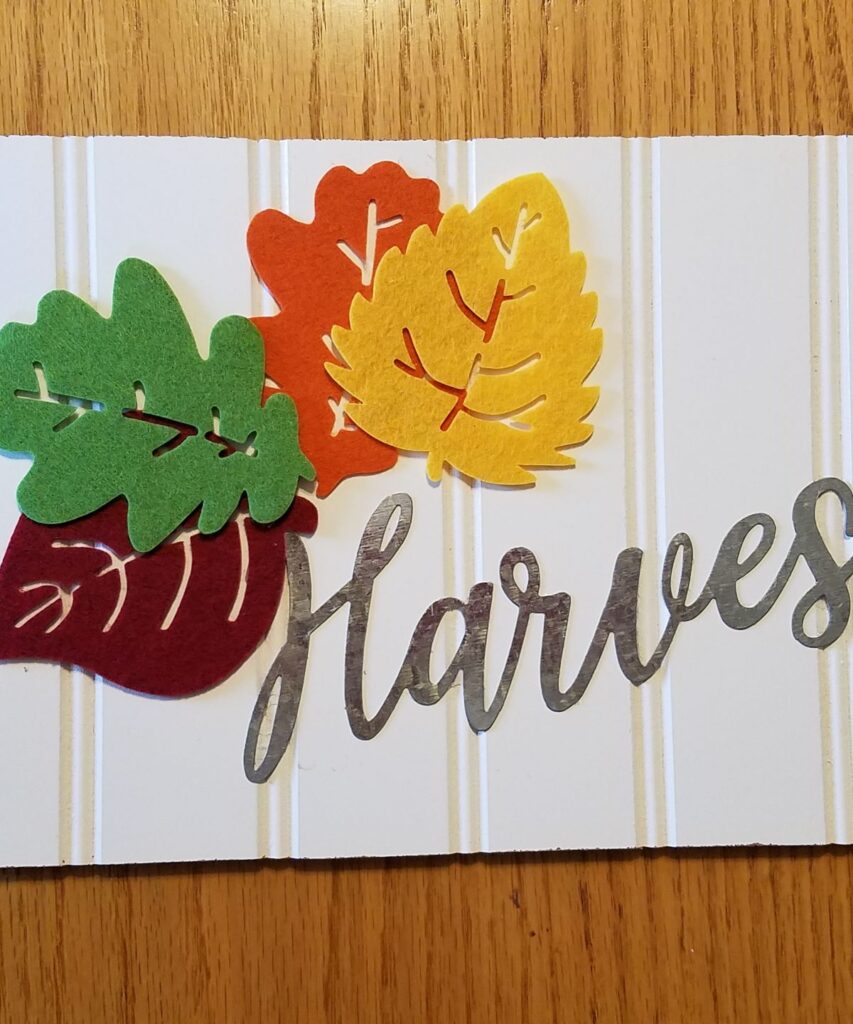 felt leaves and metal harvest word