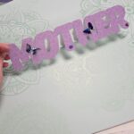 blue butterfly stickers on purple mother card