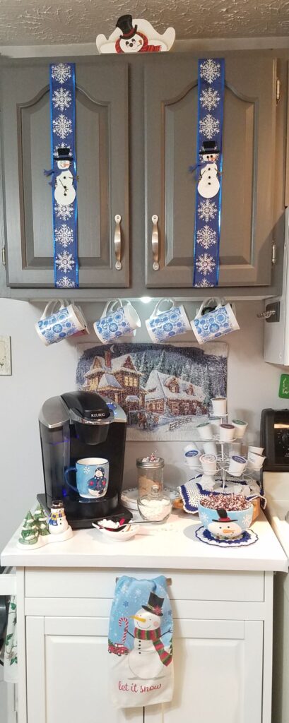 coffee station decorated with snowmen