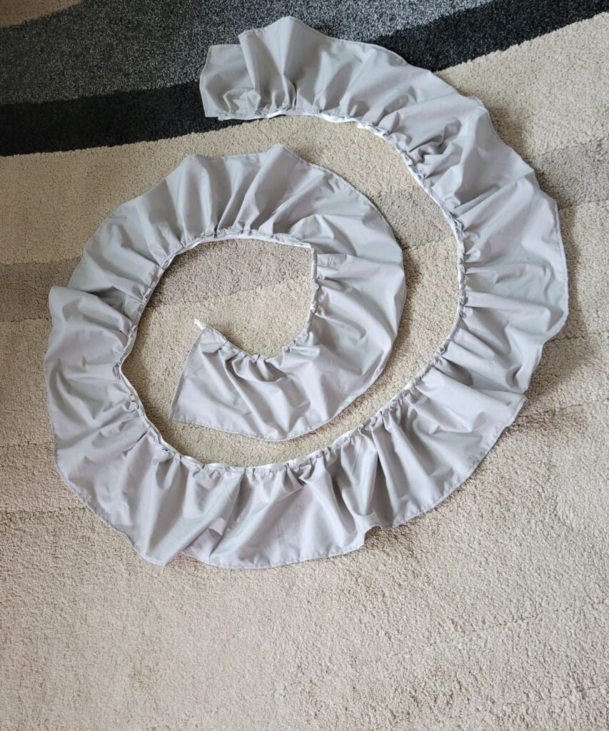 ruffled gray fabric in a spiral