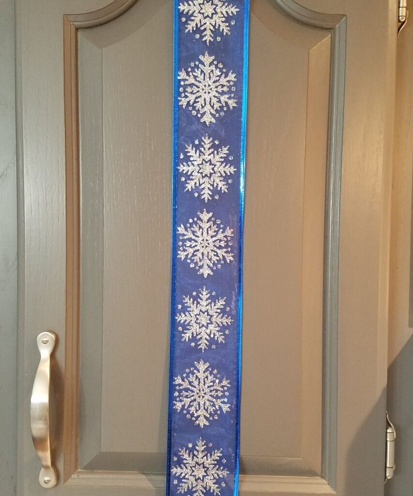 snowflakes on blue sheer ribbon