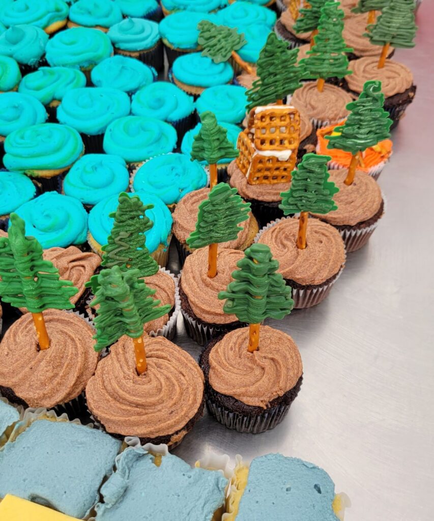trees and cabin on cupcakes