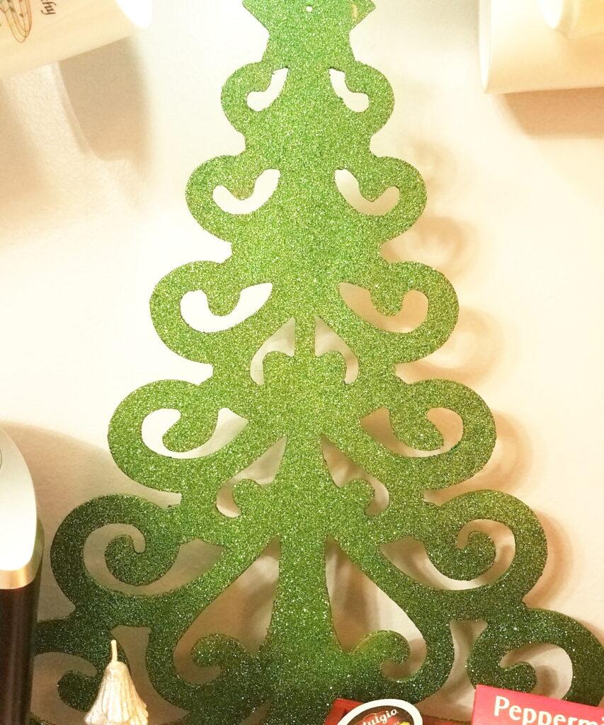 green glitter on tree cutout