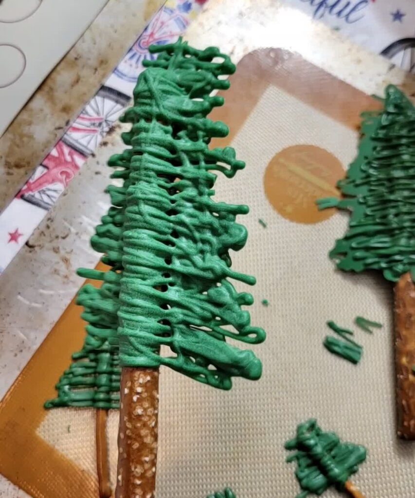 large tree made out of pretzel and green chocolate