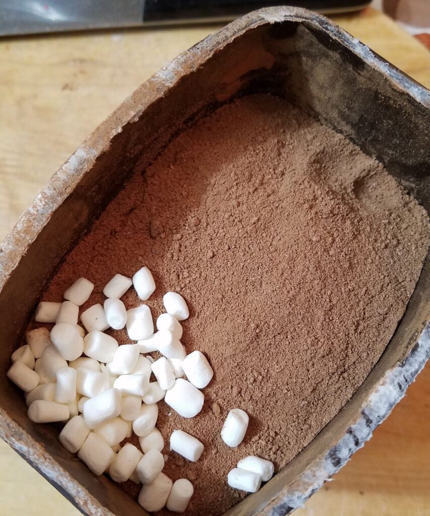 mini marshmallows in brown powder