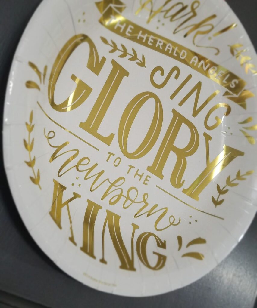 paper plate with gold words