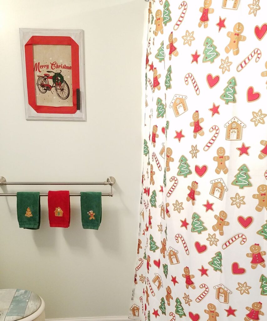 closeup of shower curtain and towels for Christmas