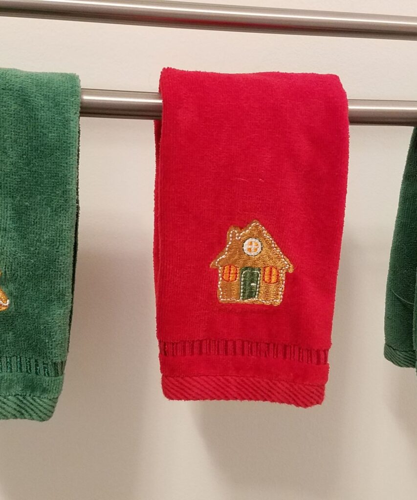 red towel with gingerbread house