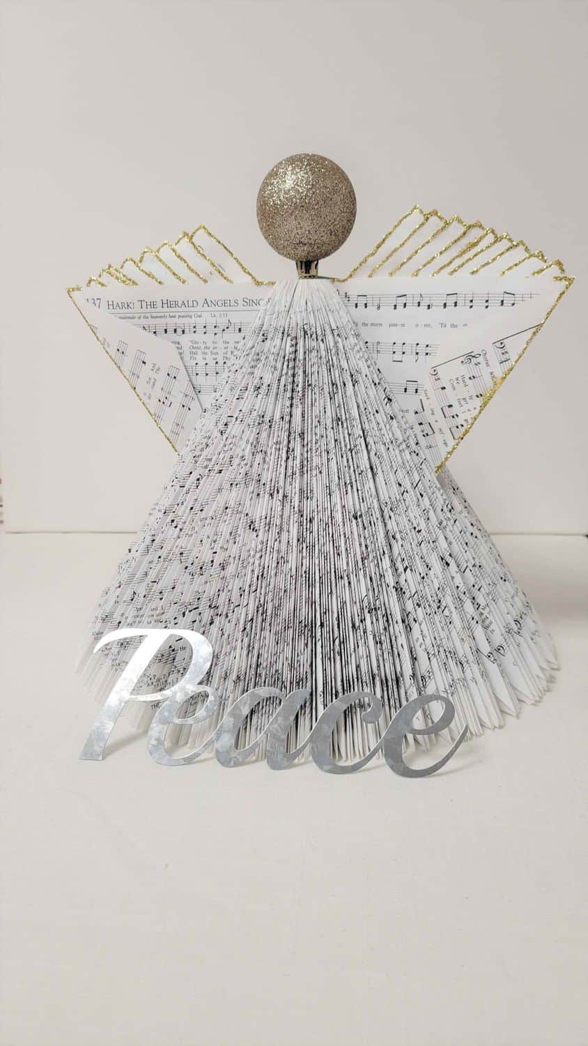 Peace metal word and book angel