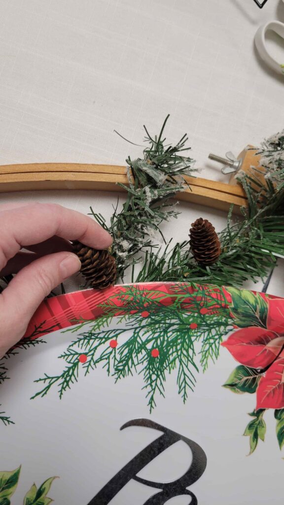 gluing small pine cones