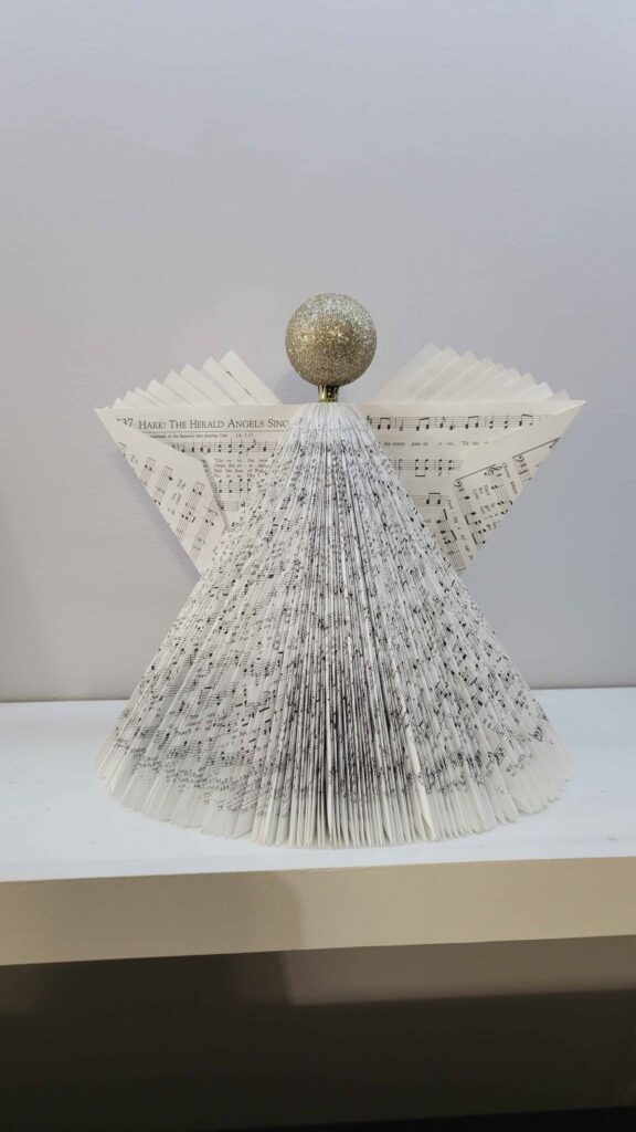 book angel with ornament head