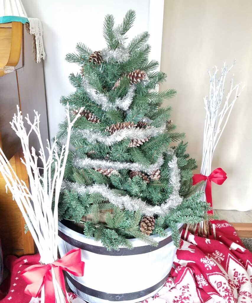 faux tree in bucket planter indoors