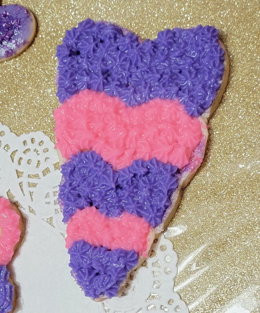 purple and pink frosted heart cookies