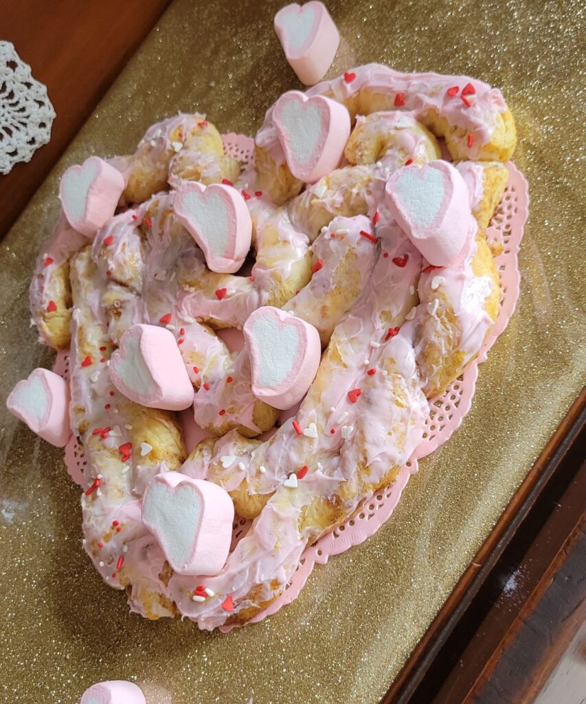 heart marshmallows on cinnamon roll