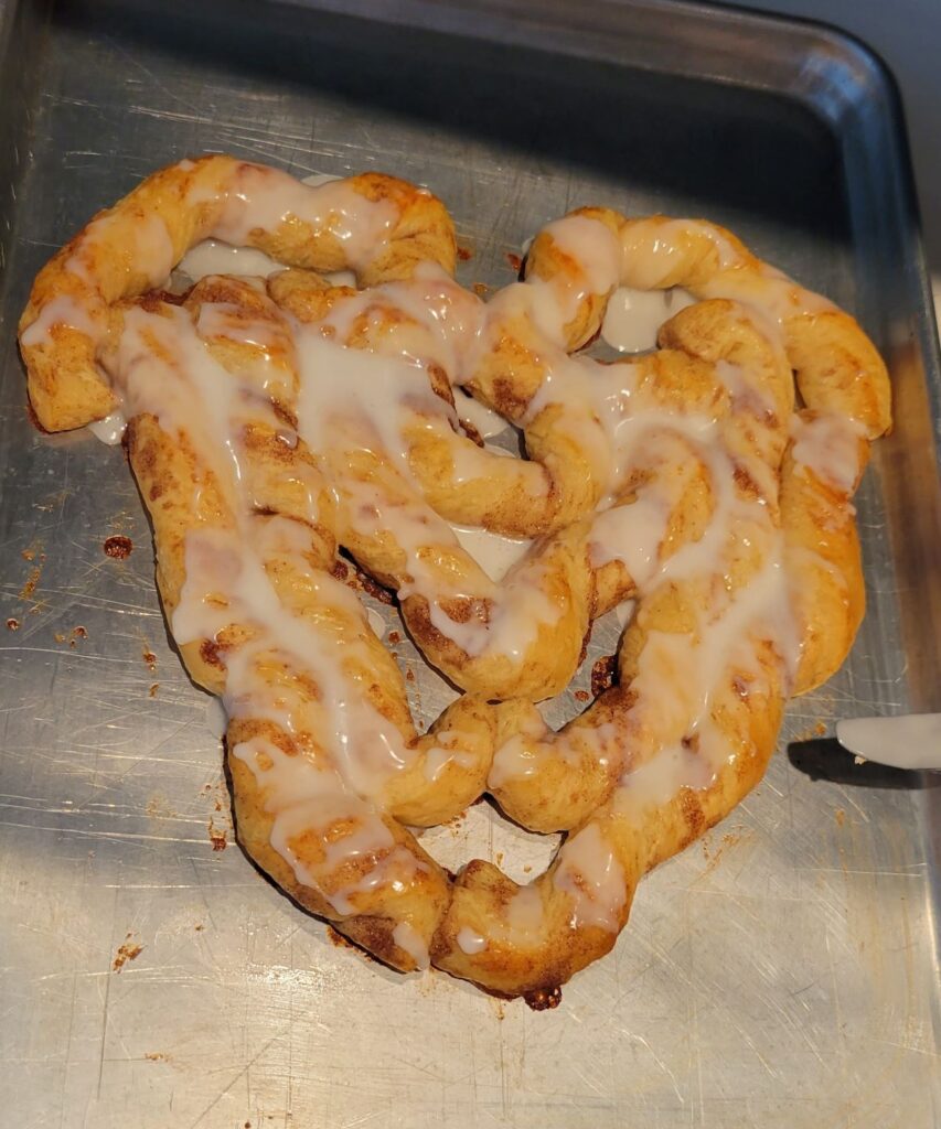 glaze frosting on cinnamon roll