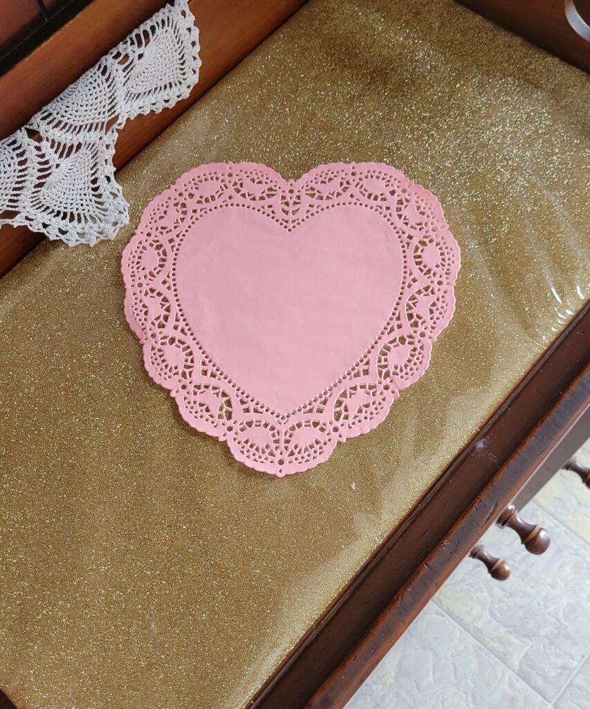 pink paper doily heart