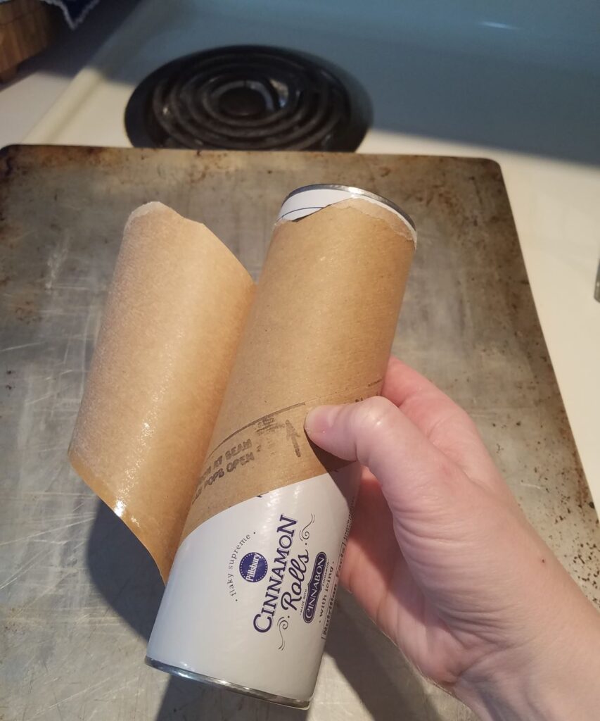 press to open cinnamon roll can