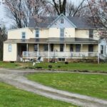 old yellow farmhouse