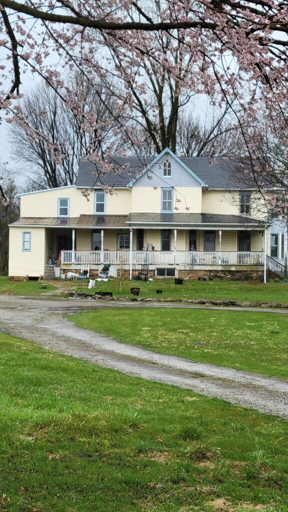 old yellow farmhouse