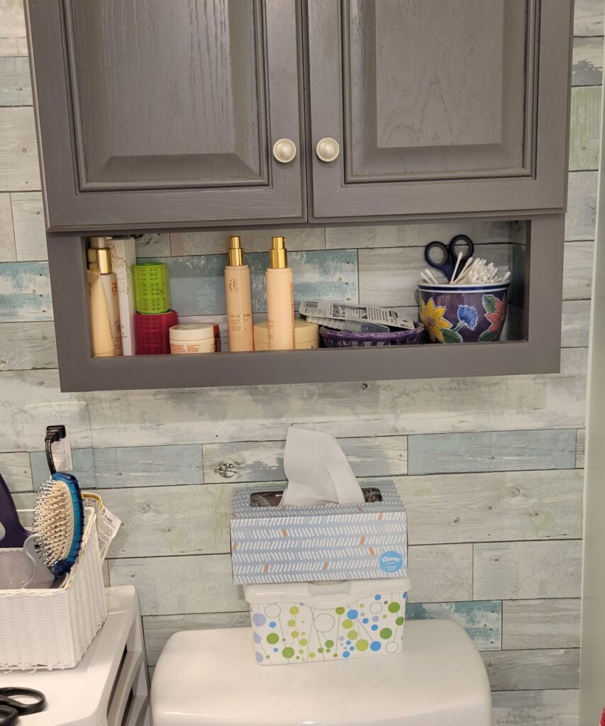 toiletries in bathroom cabinet