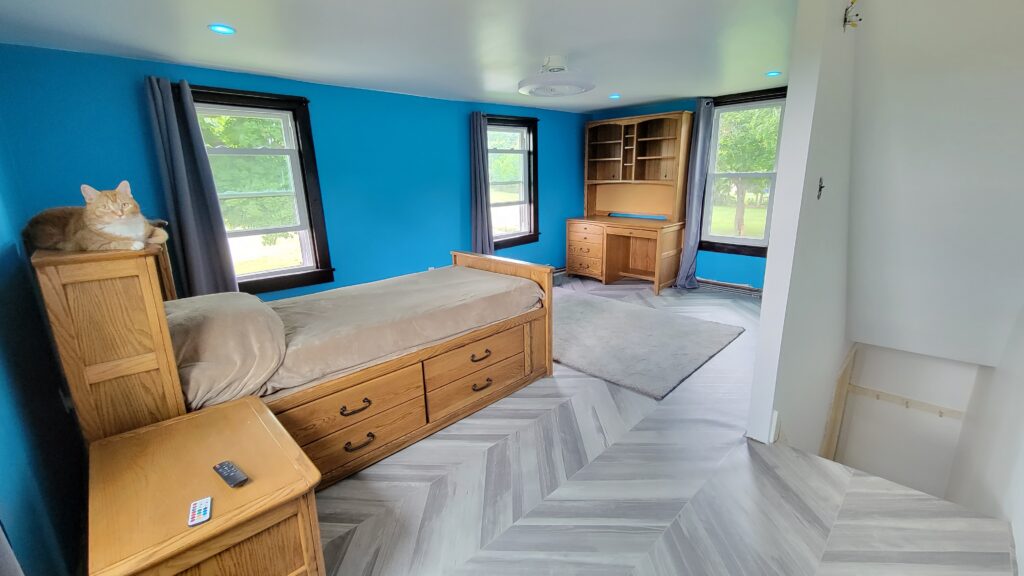 Bright blue walls in bedroom