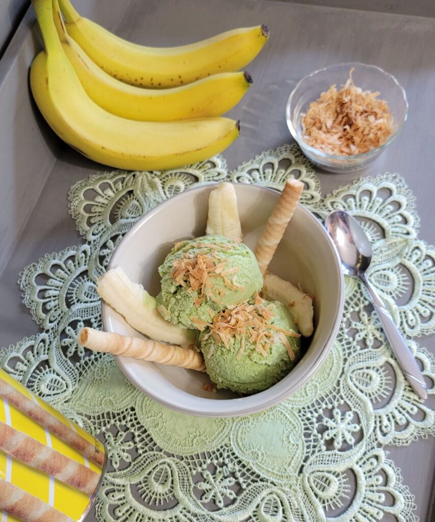 spinach ice cream with a banana and wafer
