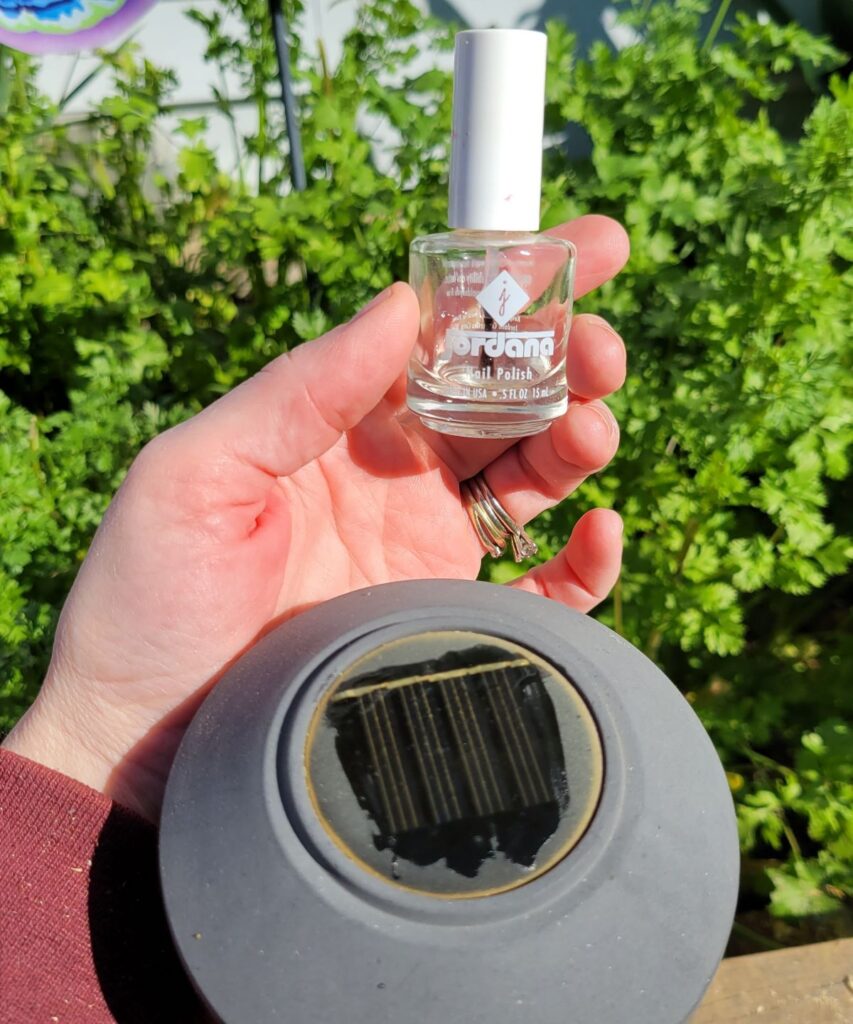 clear nail polish on solar light