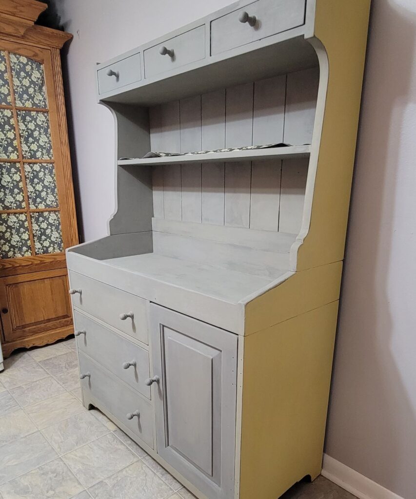 gray and yellow hutch