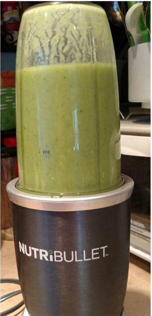 nutribullet with green stuff in it