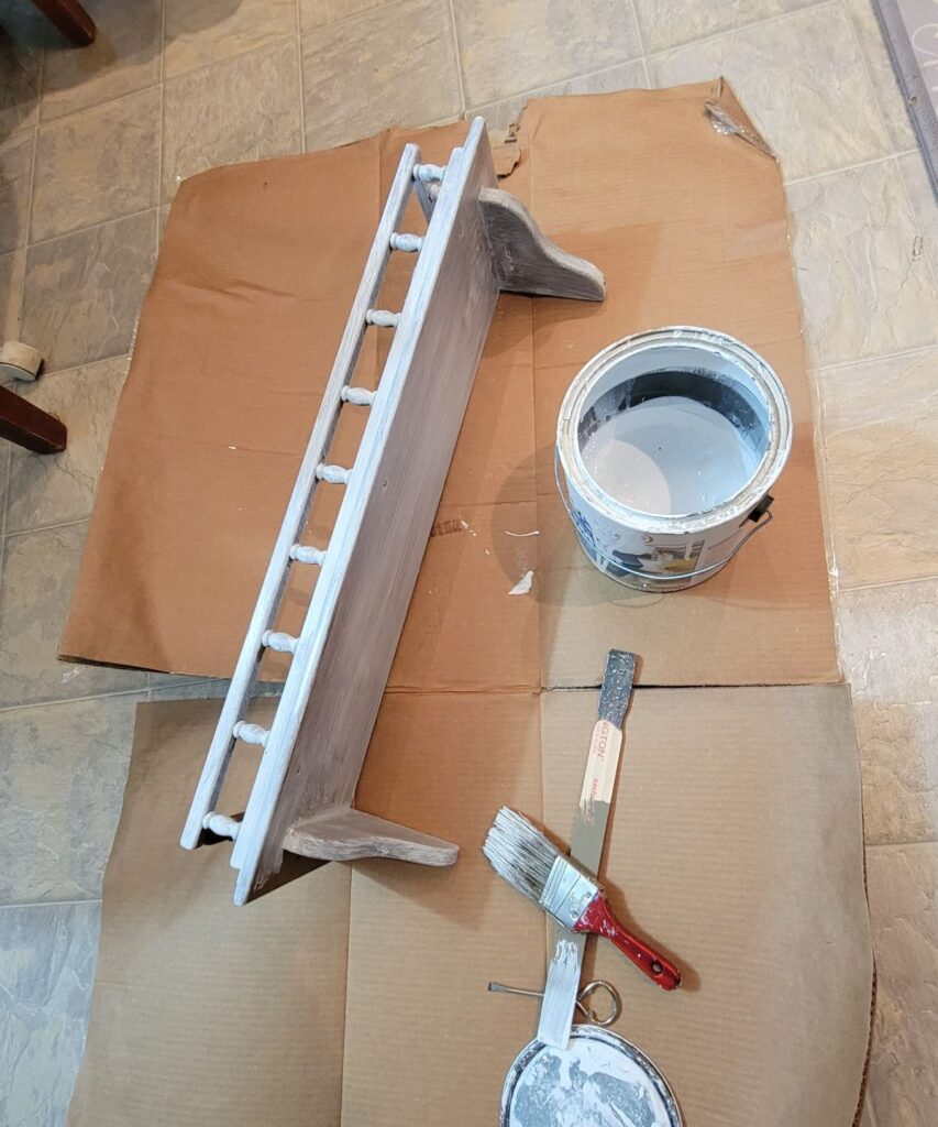 wall shelf with primer on it