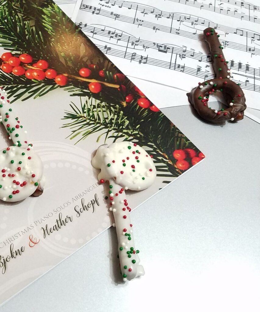 chocolate covered pretzel in the shape of a music note