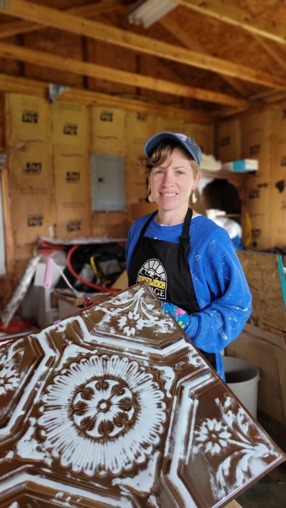 person with tin ceiling tile