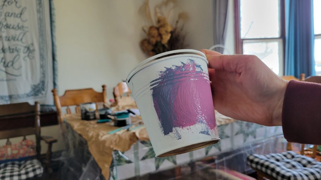 purple paint on a pail