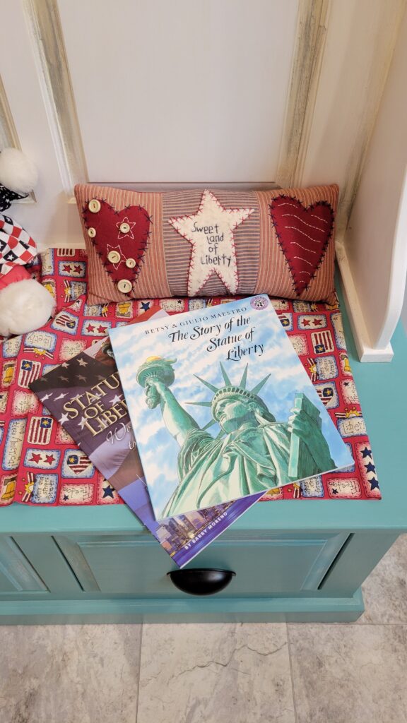Statue of Liberty books and pillow