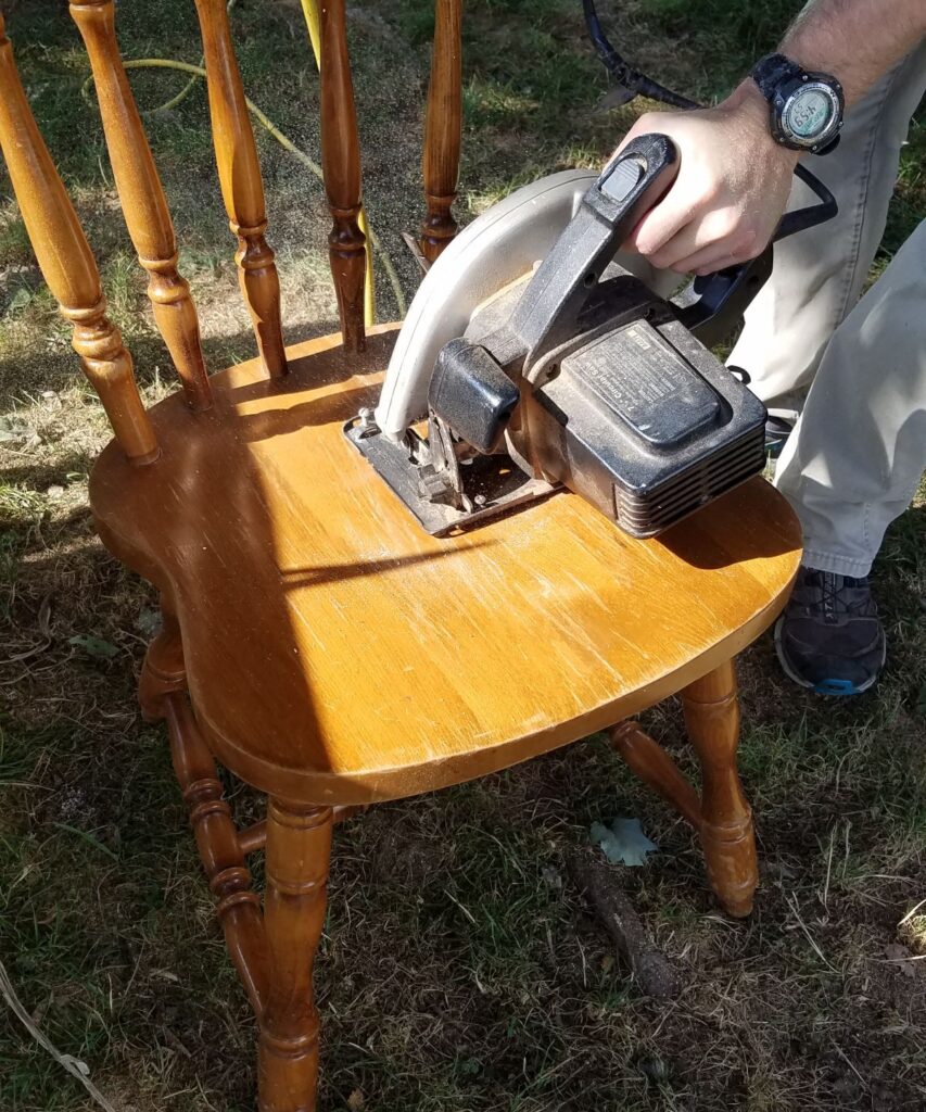 sawing chair in half