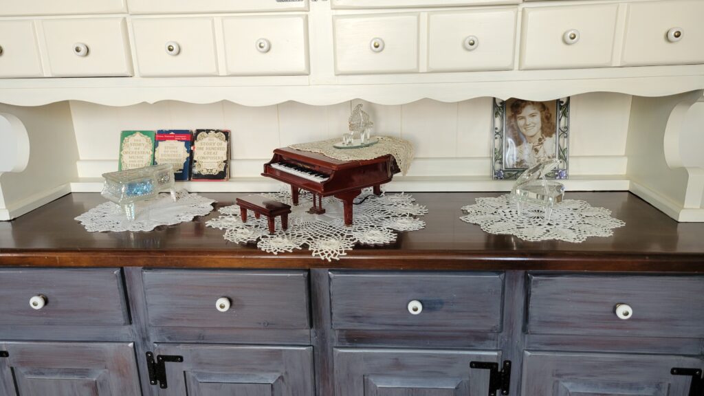 hutch with piano decor