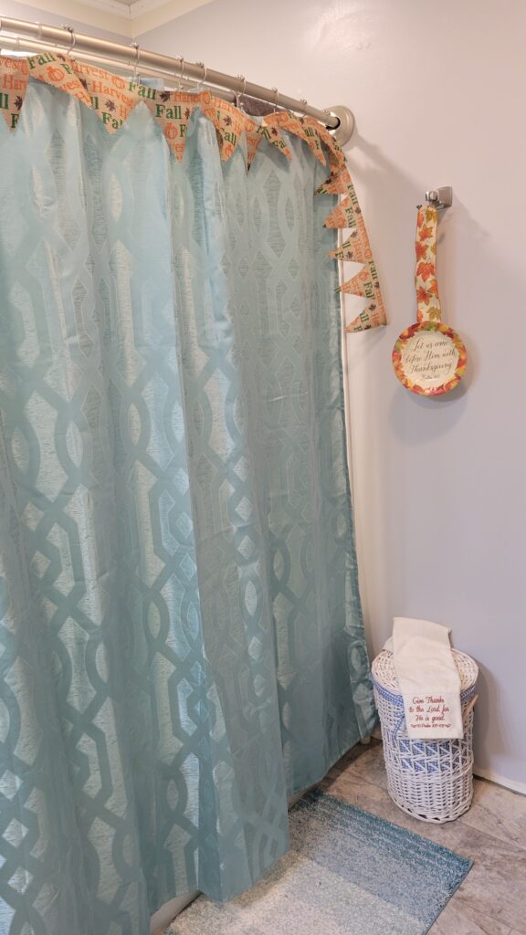 shower curtain with fall banner