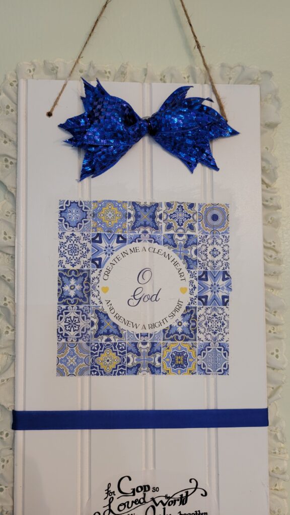bright blue bow and blue napkin on sign