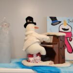 snowman playing the piano