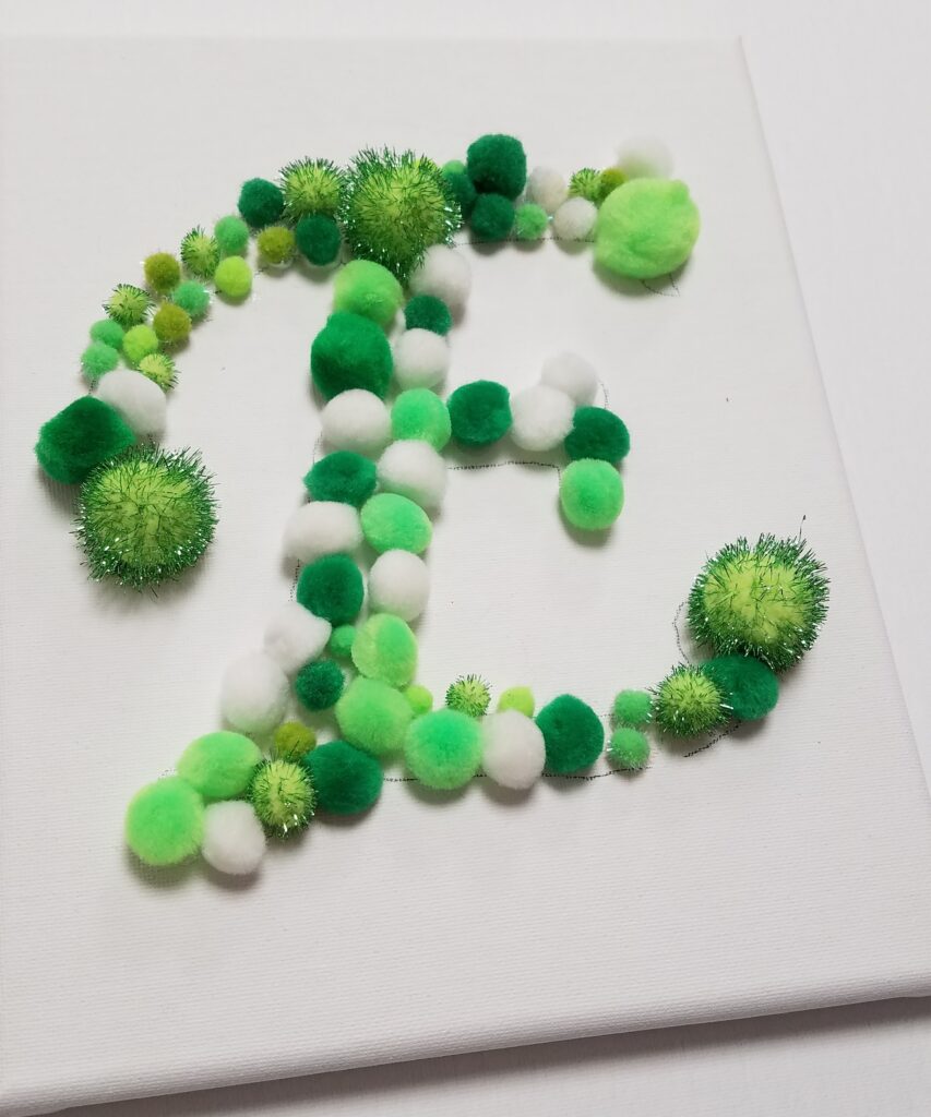letter E in pom poms