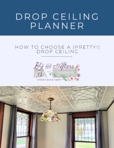 tin tile drop ceiling with stained glass light and windowns