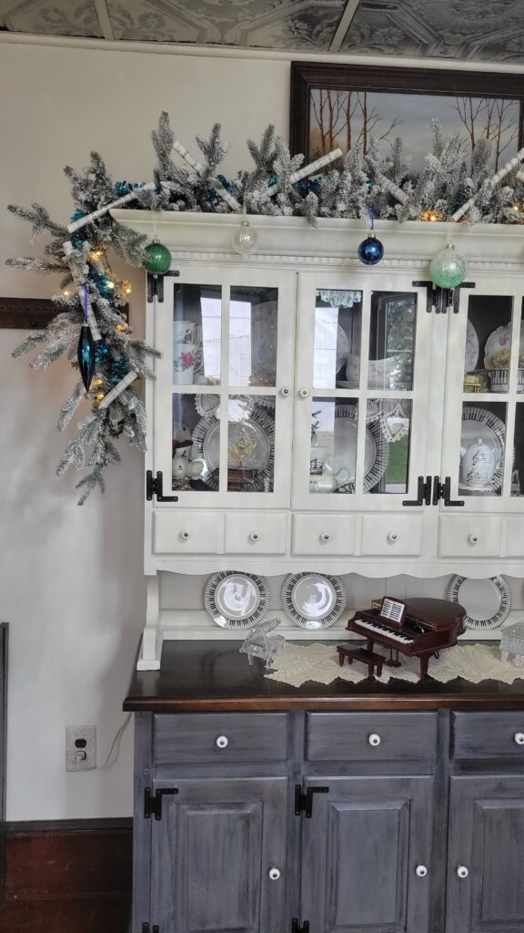 dining hutch with glass ornaments