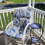 blue and white patio chair on a porch