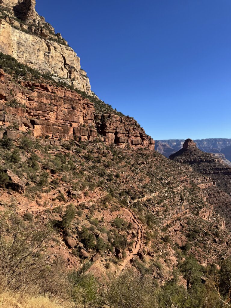 tiny person on trail in Grand Canyon