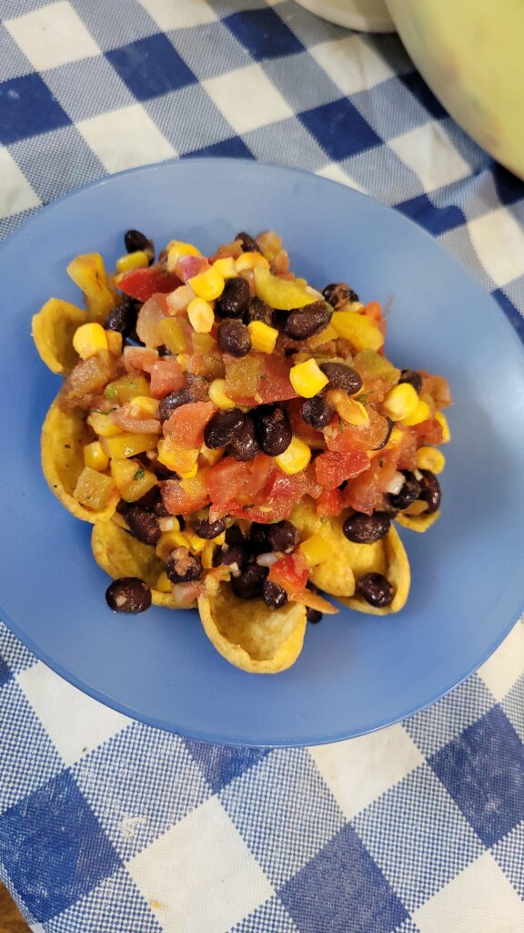 salsa on frito scoops in a bowl